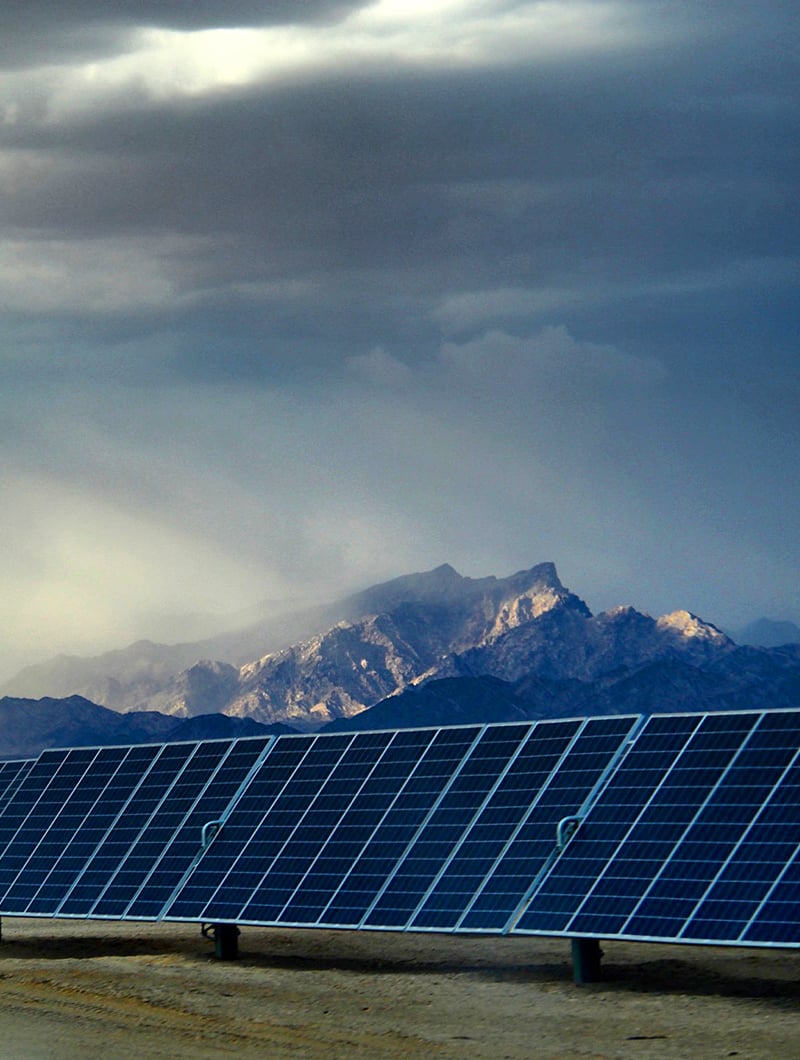 Solar grid with mountain in the background